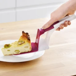 Pelle à tarte avec poussoir